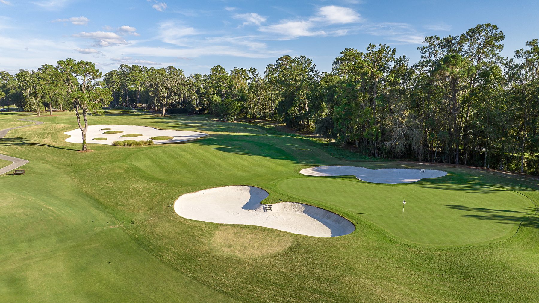 Greenside bunkers guarding a green at Golden Ocala