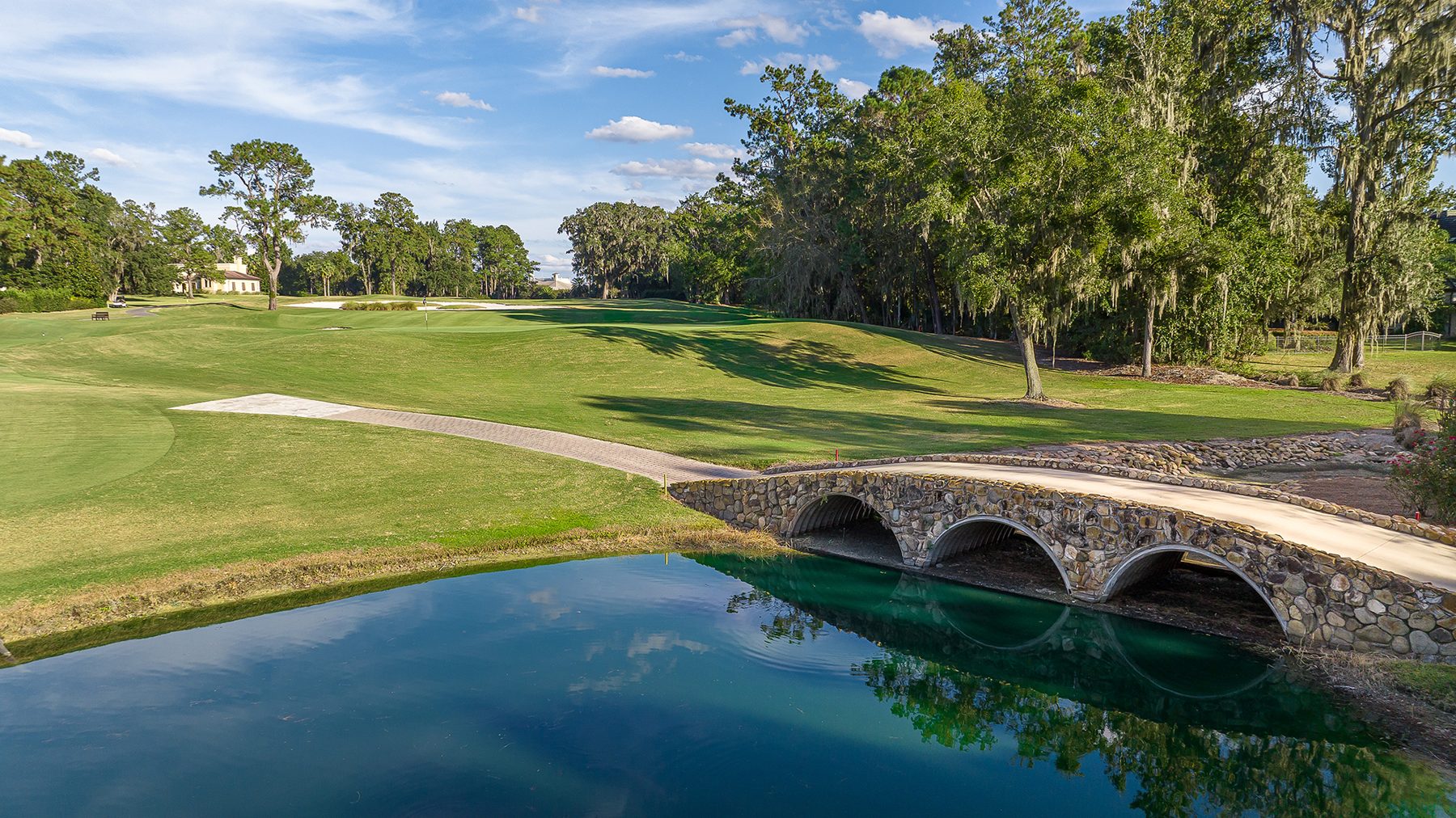 Stone bridge crossing the water at Golden Ocala Golf & Equestrian Club